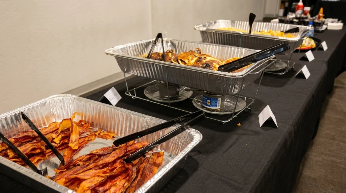 Catering pancake platter with bacon — scratch-made breakfast for groups