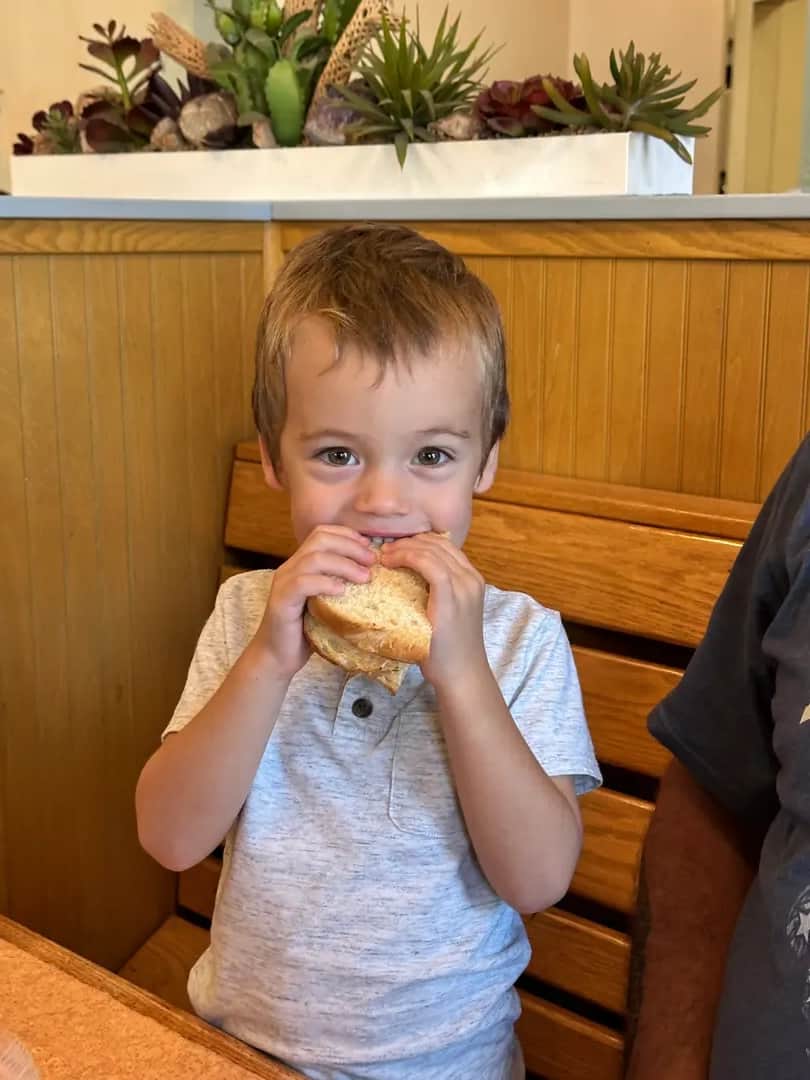 Delighted child with their favorite sandwich